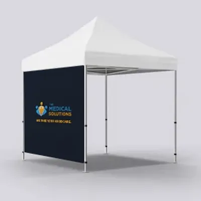 A canopy tent with a white top and a branded back wall reading 'MEDICAL SOLUTIONS - We care for your care.' It’s set against a plain, light background.