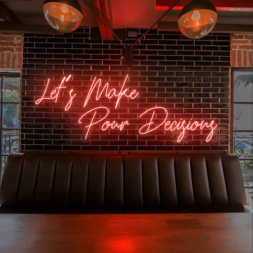 Eye-Catching "Let's Make Pour Decisions" Neon Sign - Australia Promo Now