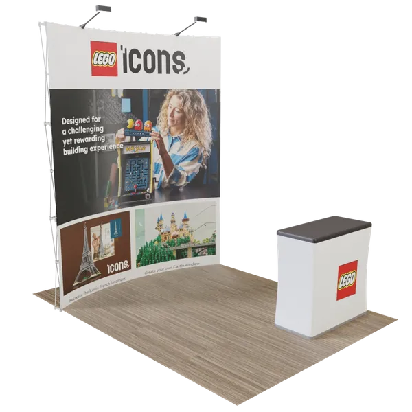 Trade show display featuring a backdrop and counter with LEGO branding, promoting an interactive building experience with icons product line.